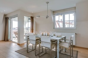 A spacious dining room that seats up to 6 people