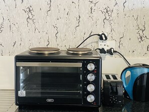 Kitchen , two plate stove, two slice toaster and kettle