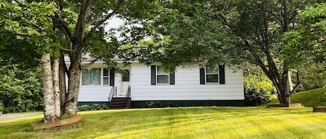 Long driveway with plenty of parking for trucks and trailers