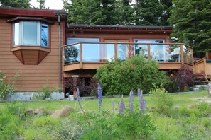 Deck, living and dining room windows plus front bedroom window facing the lake