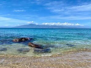 Directly across the road is the beautiful, Kahana beach which overlooks Molokai