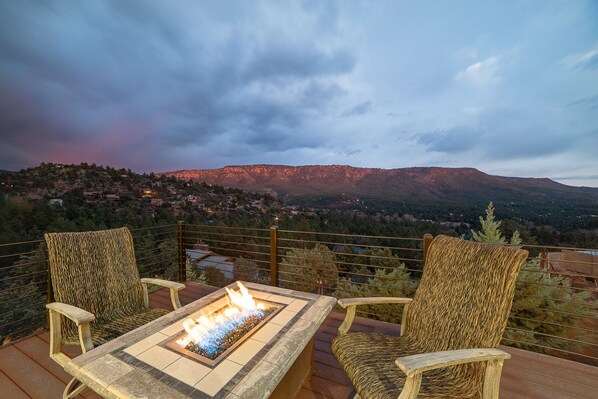 You'll never want to leave this beautiful home after sitting on the deck with a glass of wine and letting the views wash your worries away.