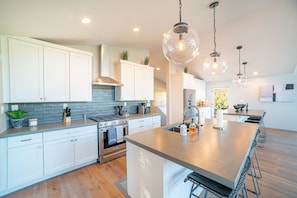 Bar seating for 7 in this open concept kitchen