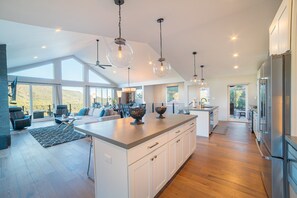 A large chef's kitchen, including double kitchen islands - an entertainer's dream!