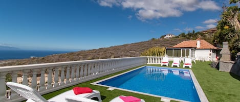 View of upper level private pool and villa
