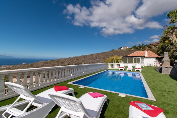 View of upper level private pool and villa