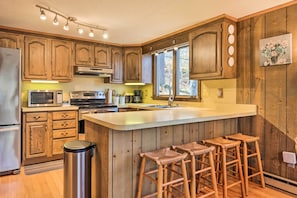 Kitchen | Private Backyard | Community Beach Access | In-Unit Laundry