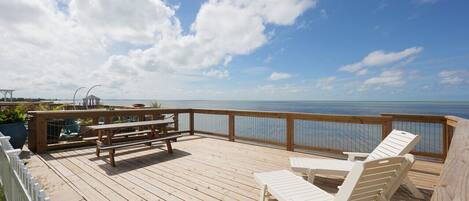 Unwind on sun loungers for a golden tan or savor alfresco meals at the picnic table.