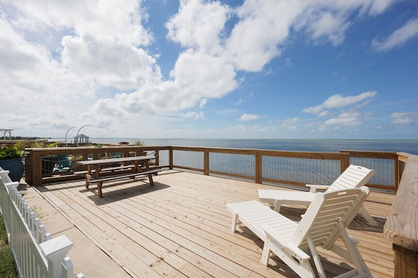 Unwind on sun loungers for a golden tan or savor alfresco meals at the picnic table.