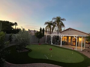 Single level home - backyard - potting green