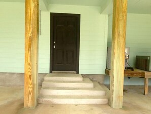 Entry to Downstairs Bedroom from Street Side