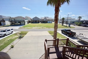 View from front porch across Commerce Street notice stairway leading from ground floor to main floor