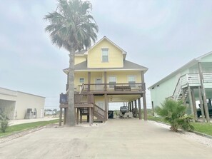 Mellow Yellow in Dolphin Point Subdivision view from Commerce Street note boat pull through to Maple not available