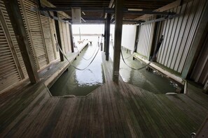 Dock and boat slips with lifts on the ICW