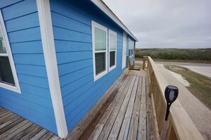 Back deck view of entry to unit