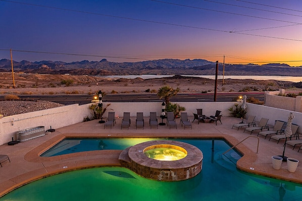 Relax by the illuminated pool and spa.