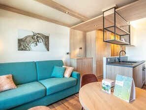 Kick back your feet and relax in the cozy living area.