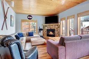 Relax By The Fire In This Cozy Living Room