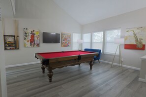 Lounge Area w/ custom 8ft pool table and 50" TV