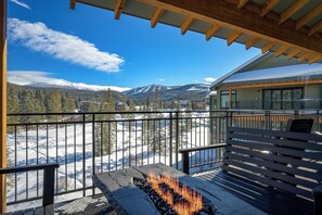 Soak in the views by the gas fire pit on the penthouse deck