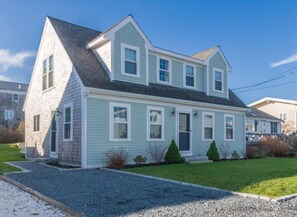 Front of the home with driveway.