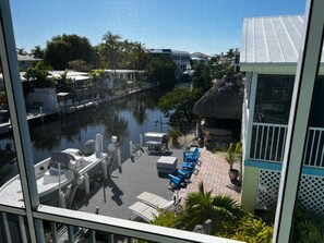 Back view of deck, dock, and canal frontage