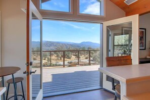 Open these double doors in the kitchen  and enjoy view of the majestic mountains