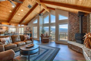 Grand Living Room with comfortable dining space.
