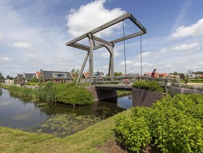 Cloud, Plant, Sky, Water, Body Of Water, Grass, Lake, Bridge, Urban Design, Leisure