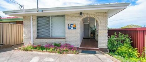 Gairdner Cottage facade...street view from the big peppie tree on the verge