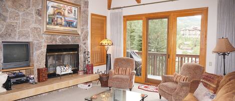 Family room with Wood Burning Fireplace and views of Mount Daly.