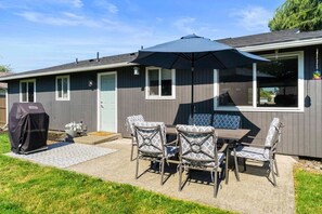 Backyard patio where we have our BBQ and outdoor dining area.