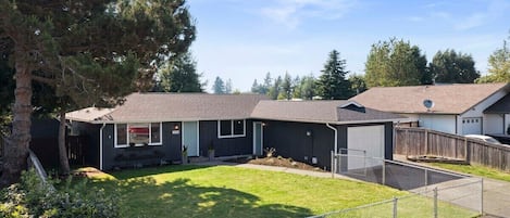 Front of House. As you can see in this photo we have a fully fenced front yard. This is in addition to our fully fenced backyard.