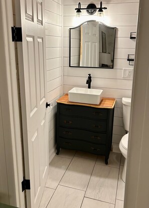 Bathroom 2: En Suite half bath