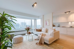 Bright living room with view over Ostend Marina