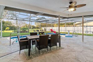 Enjoy Florida weather outside on the patio and pool area.