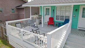 Back porch - Back porch with grill and seating.  Looks at the water/dock.