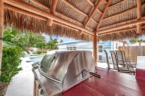 Tiki hut with Bar, seating, BBQ