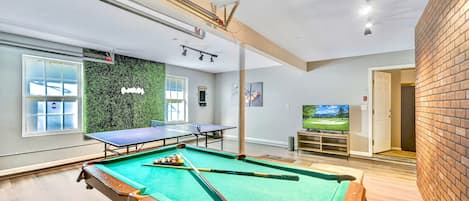 Game room with pool table, ping pong, and PS4. Game on!