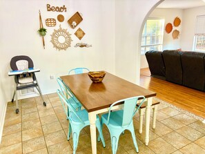 Dining room seating for six, 2 at the Bartop.