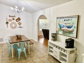 Kitchen and dining room open to both living rooms