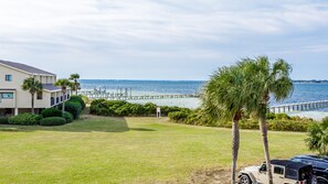 Watch sail boats skim across the bay.