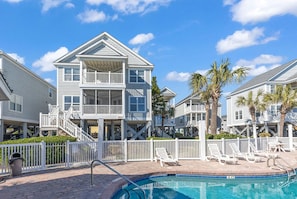 House enjoys a premium location right next to the pool.
