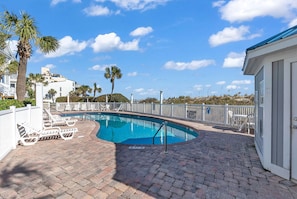 Experience the private pool setting shared by 10 beach house owners.