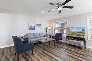 Spend quality time with family and friends in the living room area.