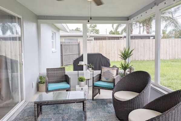 Kick back on the patio—it can comfortably seat six.