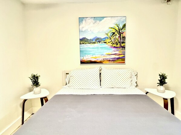 Comfortable large bedroom with Queen Bed.