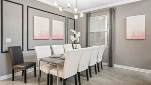 Dine in elegance and comfort in our spacious dining room, offering you the perfect setting for enjoying meals and creating memorable moments during your stay.