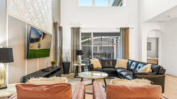 Kick back and relax in our spacious living room, where you can unwind with your favorite book or movie.