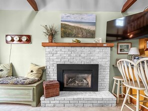 Gas fireplace with smart TV set up for streaming.